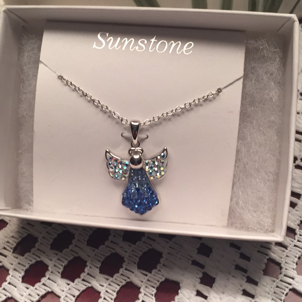 Pretty angel with blue and crystals stones